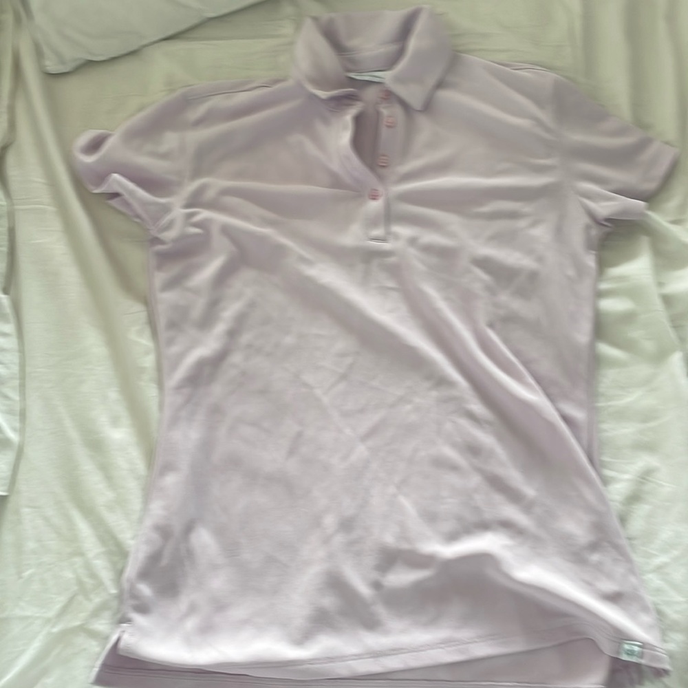 Pink golf polo